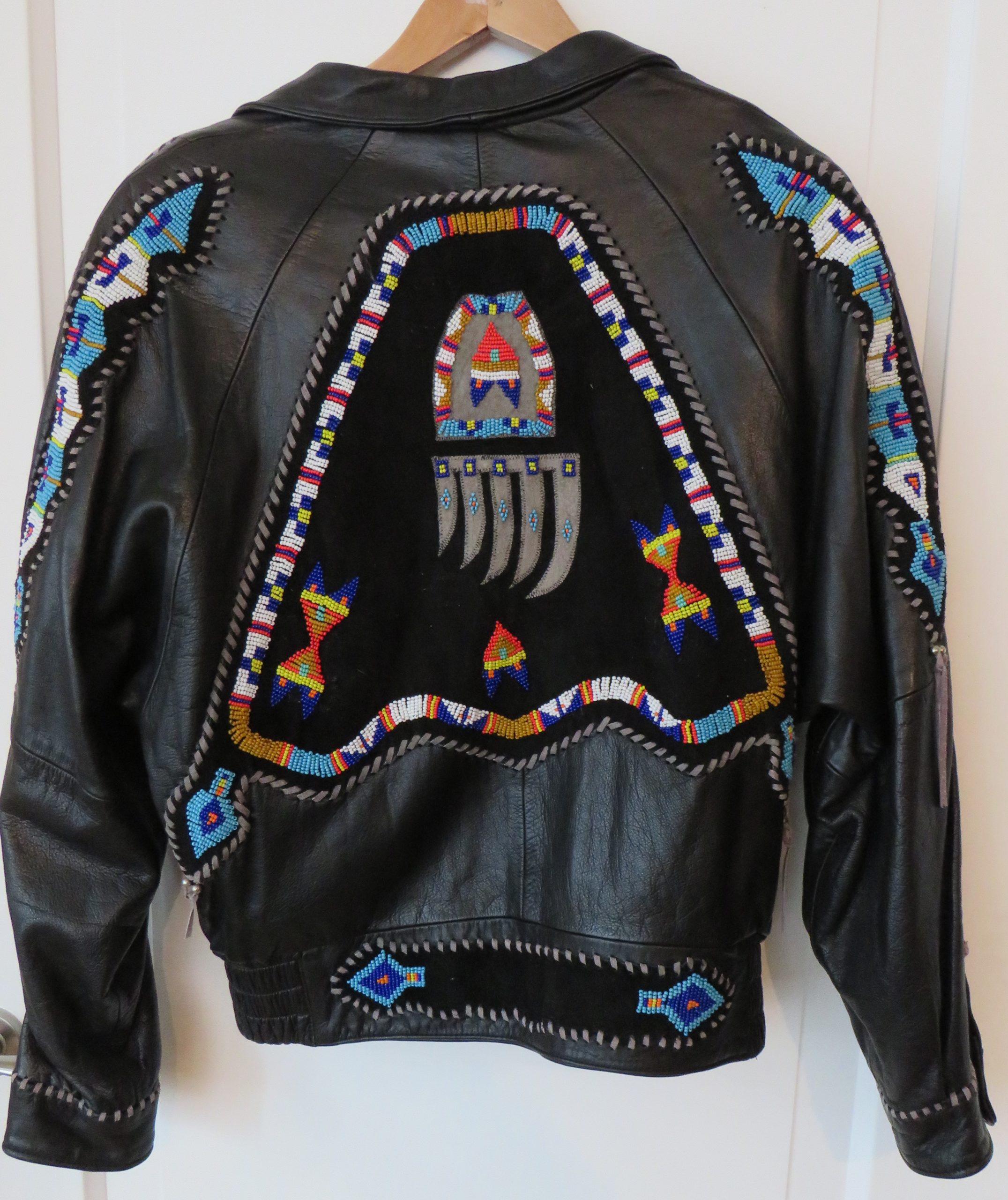 Indian style short black leather jacket with bearclaw & beadwork