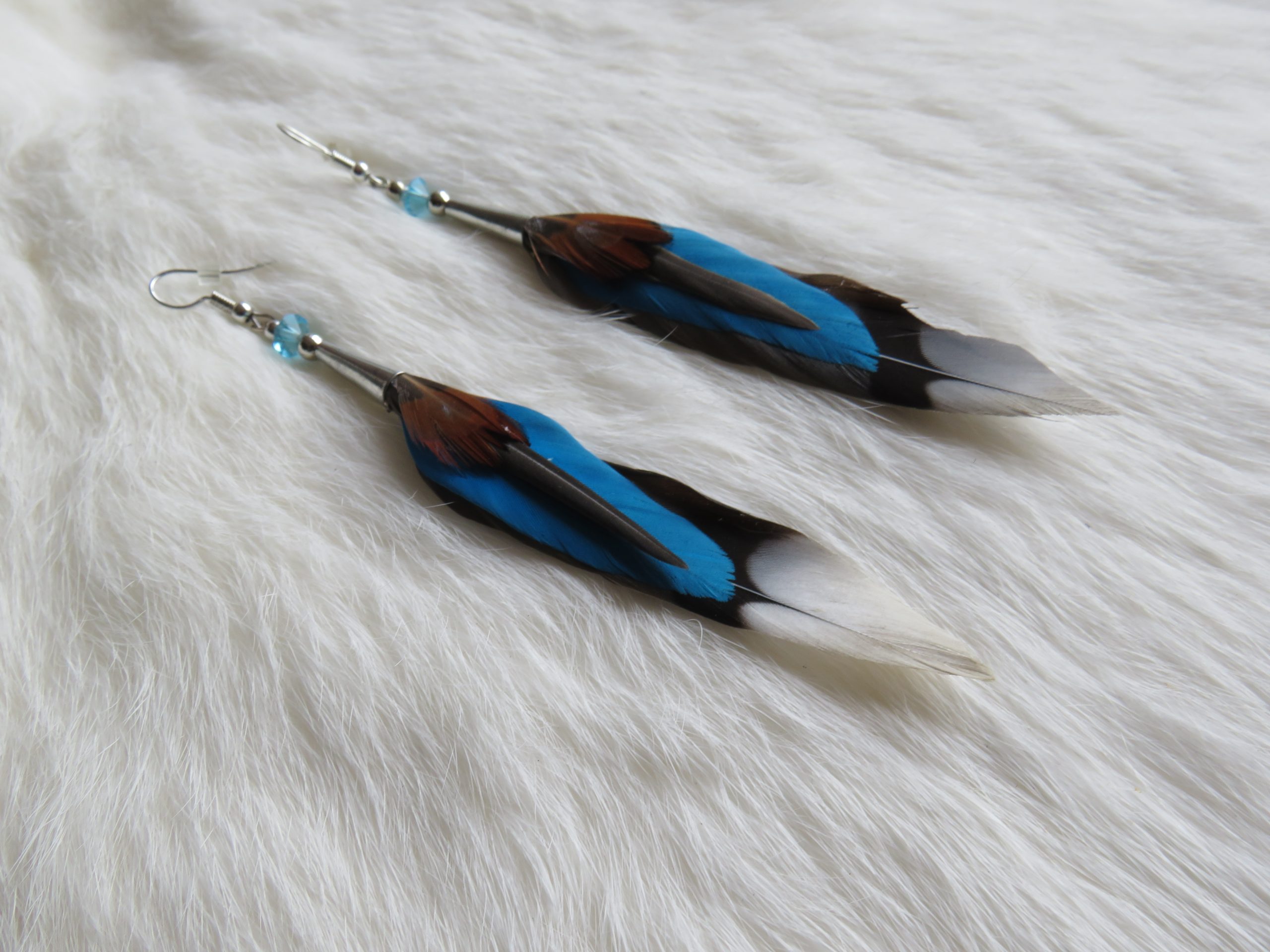 Authentieke fazantenveren oorbellen lang blauw