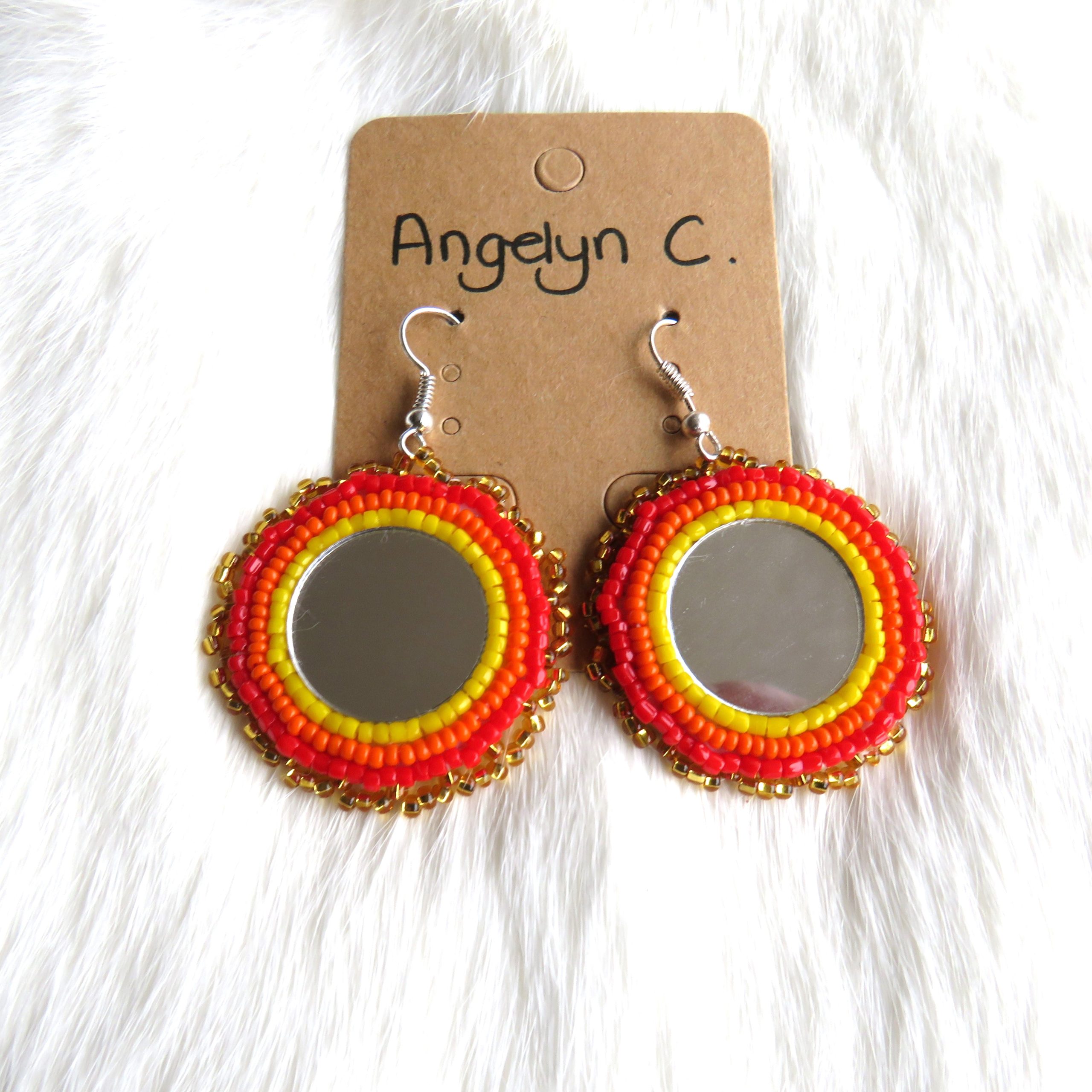 Authentieke ronde kralenwerk oorbellen oranje/rood Angelyn (KIOWA)