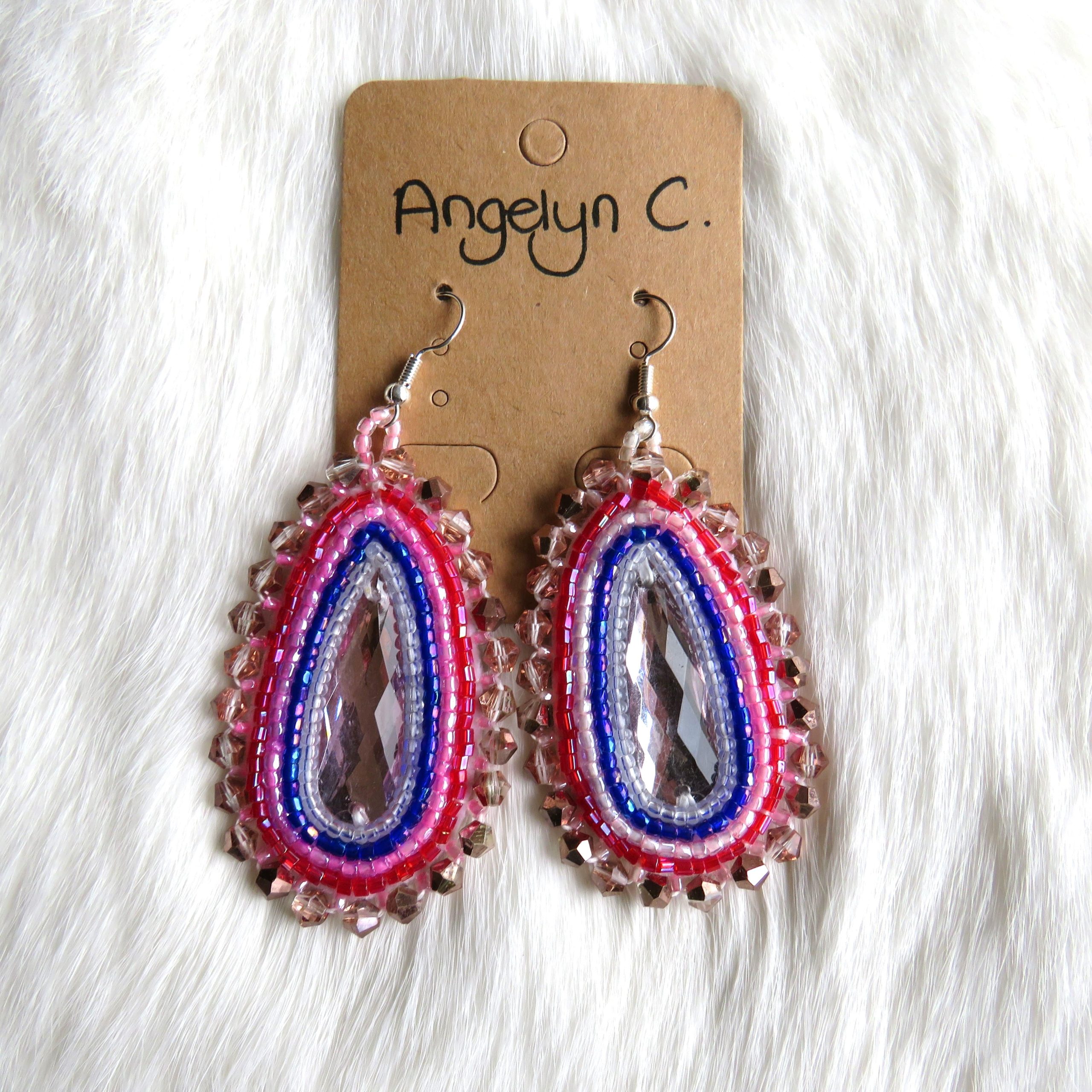 Authentieke ovale kralenwerk oorbellen paars/roze Angelyn (KIOWA)